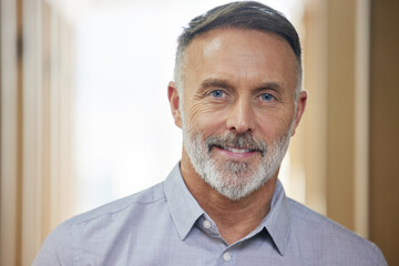 Poster - Mature, businessman and portrait with smile in office for career with confidence, happy and positive. Manager, boss and financial planner with pride for job in Australia with person in corporate.