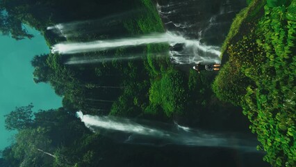 Wall Mural - Travel people enjoy beautiful Sekumpul waterfall Bali the tallest and most beautiful waterfall in Bali Indonesia 4K