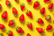 Strawberry pattern on bright yellow background