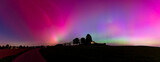 Fototapeta Sypialnia - Colorful northern lights in the Allgau in southern Germany