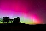Fototapeta Sypialnia - Colorful northern lights in the Allgau in southern Germany