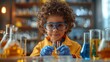 © Rasheeda - Cute little boy making science experiments in the laboratory. Science and education concept.
