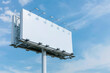 © Adil - Outdoor billboard for high-quality mockups, white and ready against a blue sky.
