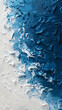 Blue and white abstract painted background with brush strokes.