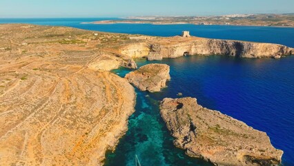 Wall Mural - Comino island, Blue lagoon and Crystal lagoon, cliff, boats. Aerial view. Maltese island