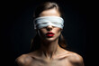 beautiful young woman in blindfold and makeup. mysterious girl