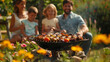 Happy family enjoying a barbecue in a flower-filled garden, with skewers of meat and vegetables grilling on the fire