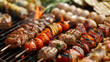 BBQ and shish kebab. Sizzling kebabs with vegetables and meat grilling on a barbecue, capturing a perfect summer cooking scene