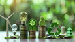 Renewable or clean energy generation prices and costs, financial concept : Green eco-friendly symbols atop coin stacks e.g. energy efficient light bulb, a battery, a solar cell panel, a wind turbine. 