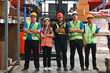 © saltdium - Multiracial Warehouse workers logistic team working in warehouse for industry business or shipping management