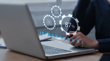 Fototapete - Businessman updating computer system for device operating system to be up to date with new version. Graphics icon showing updating function screen loading on computer laptop.