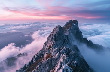 Wall Mural - Photograph of two mountain peaks emerging from the clouds 