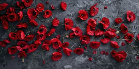 Canvas Print - A bunch of vibrant red flowers displayed on a table. Suitable for various occasions and events