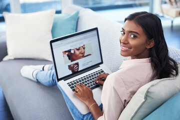 Aufkleber - Smile, laptop and portrait of woman on sofa for beauty research online in living room at home. Happy, technology and Indian female person working on creative makeup website project with computer.