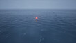 Sea buoy swings on the waves, aerial view