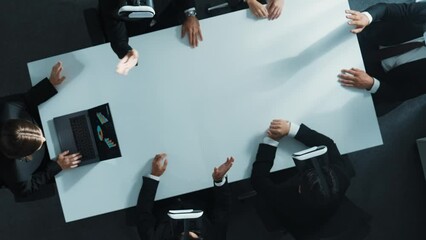 Poster - top down aerial view of professional business team wear vr headset to enter virtual world while sitt