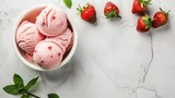 Fototapeta  - Delicious strawberry ice cream in a bowl on white marble table, strawberries on the table