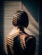 Woman silhouette in blinds shadows. Back of Beautiful Naked Body Girl with short Hair