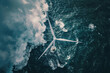 Aerial view of wind turbine at sea 
