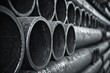 Black and white image of a row of pipes.