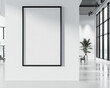 © Kiran - Modern architecture firm with one large blank poster in a professional black frame spotlighted on a sleek white wall for architectural project advertisements or design concepts