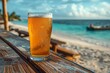 At the seaside patio, a glass of cool beer offers refreshment amid a sunny beach holiday.