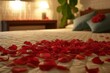 Romantic Bed covered with rose petals. Romantic honeymoon luxury bedroom atmosphere. Generate ai