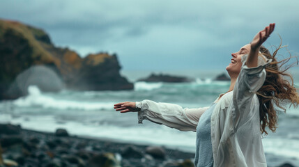 Wall Mural - Woman Standing on Top of Beach by the Ocean