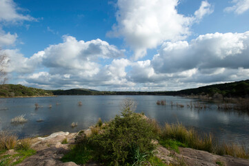 Wall Mural - clouds over the lake, Lago di Baratz. Sassari, Alghero, Sardegna, Italia..Baratz Lake. Sardinia, Italy