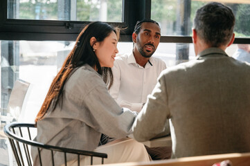 business people talking in cafe