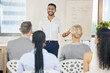 © peopleimages.com - Presentation, businesspeople and questions with whiteboard in office or boardroom with speaker or manager. Pr, meeting or financial plan with training for global marketing campaign in the Netherlands