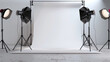 © Santy Hong - Professional Photo Studio Background. Photography Equipment in Studio Setting. Cameras, Lights, and Backdrop Setup for Professional Photo or Video Production.