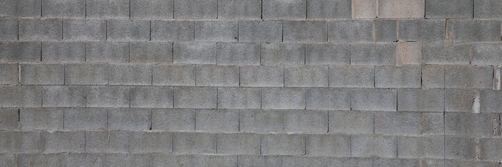 Wall Mural - old gray cement background with cinder block wall