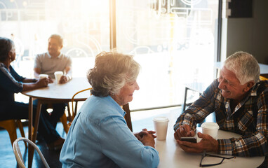Aufkleber - Senior couple, phone and happy in coffee shop for date with online news, social media post and reading information. Elderly, people and smartphone in cafe with smile for bonding, retirement and relax