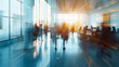 © Kehao - Modern Office Space with Blurred Motion of Employees Walking and Working in a Bright Open Environment. Collaborative and Dynamic Workplace Concept.