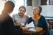 Senior couple, talking and lawyer with documents for financial advice, retirement plan and will at home. Old man, elderly woman and attorney with paperwork, budget negotiation and legal agreement