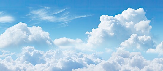 Aufkleber - A wide background with a blue sky and fluffy clouds perfect for a summer template or backdrop image with copy space