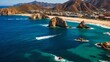 Aerial image showcases the iconic Arch at Lands End, Cabo San Lucas, where the Pacific Ocean merges with the Gulf of California.