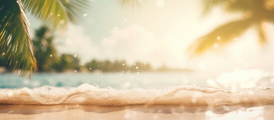 Poster - Abstract background with a blurred tropical beach and bokeh sunlight waves providing ample copy space for an image