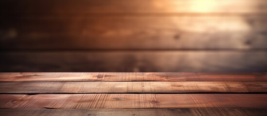 Poster - Wooden background with a blurry surface showcasing natural lighting and shadow This copy space image represents the concept of a wooden background