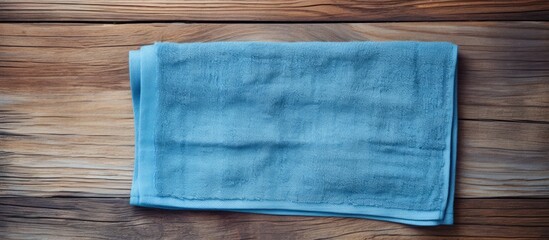 Aufkleber - Wooden background with a towel creating a copy space image