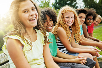 Students, summer and portrait of children in park for outdoor bonding, adventure and school trip. Happy, diversity and group of kids in nature for friendship, connection and holiday in Washington dc