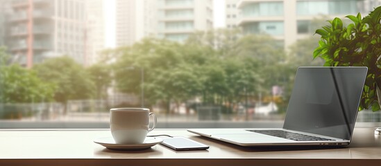 Poster - A workplace featuring a desk with a digital tablet and a coffee cup providing a copy space image