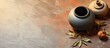 A flat lay image showcasing a calabash bombilla and a jar of mate tea leaves placed on a tiled table The composition leaves room for text. Creative banner. Copyspace image