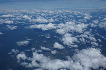 Wall Mural - View from an airplane window to see the sky and white cloud