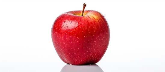 Poster - A red apple is shown in isolation on a white background with ample space around it for copy or other images