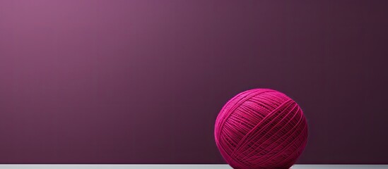 Aufkleber - A large magenta ball of thread stands out against a gray background leaving plenty of space for an image. Creative banner. Copyspace image