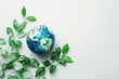 Frame of Earth globe with green plant on beige background. World environment, Earth day. Environment and conservation concept. Environmental problems and protection. Caring for nature and ecology