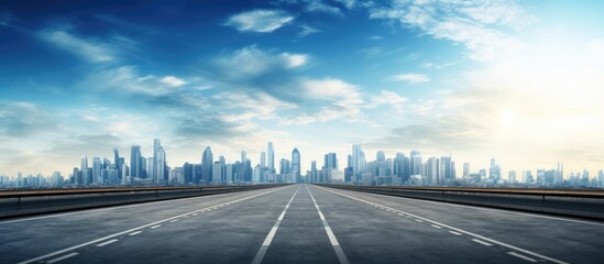 Aufkleber - Empty road with panoramic skyline and buildings in the background a copy space image