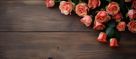 Leinwandbilder - A wooden background with a beautiful bouquet of roses leaving room for additional content